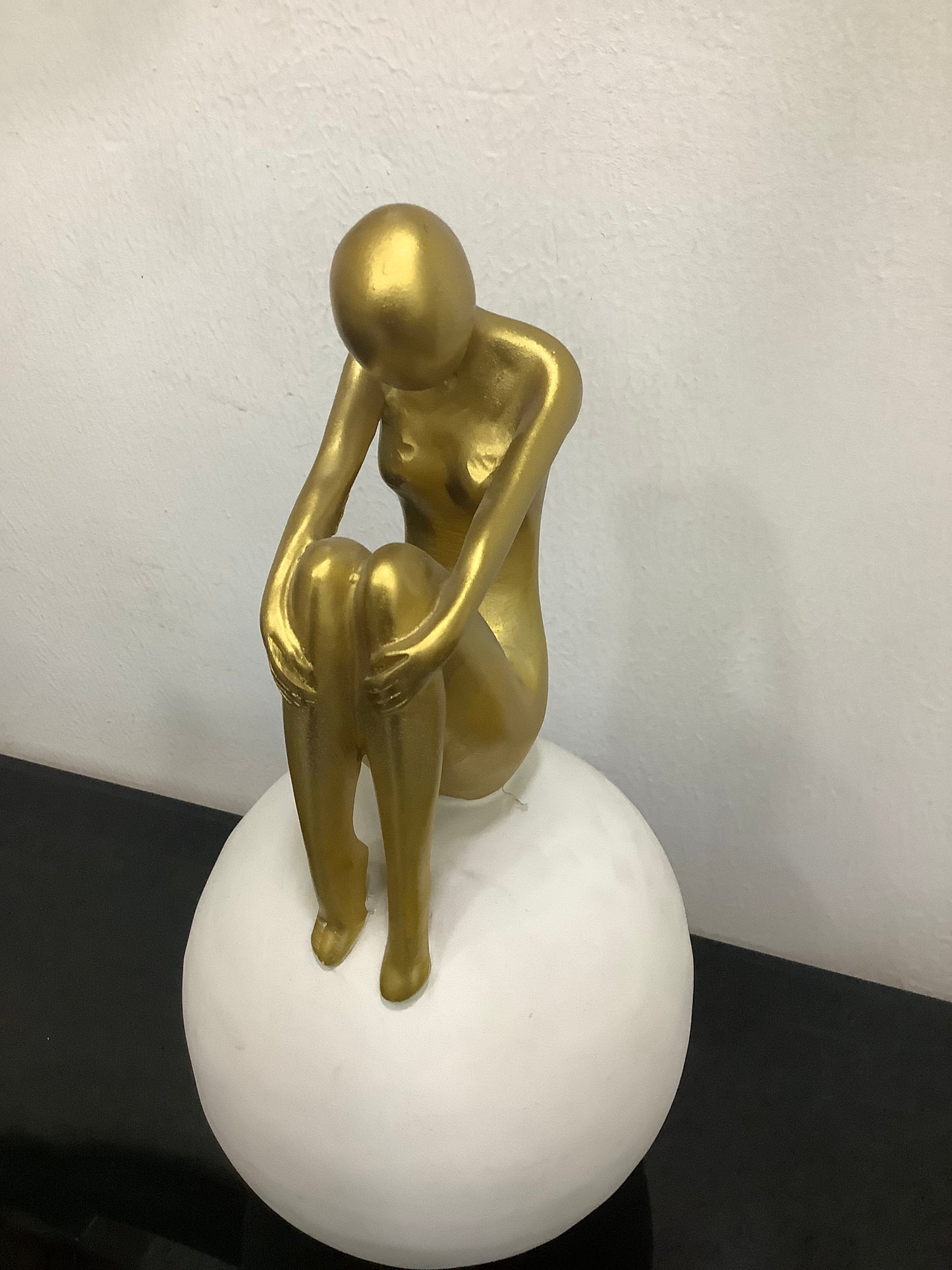 Girl on white ball decor