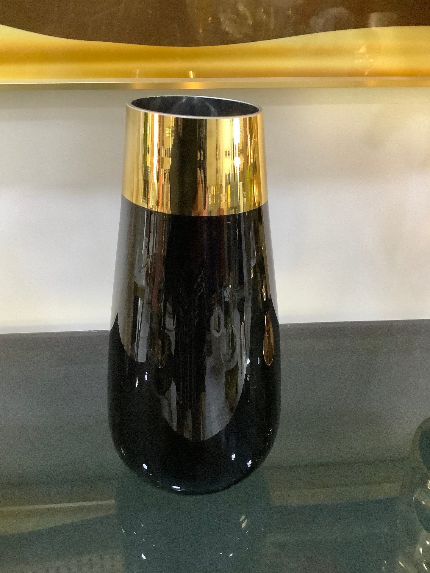 Black and gold vase