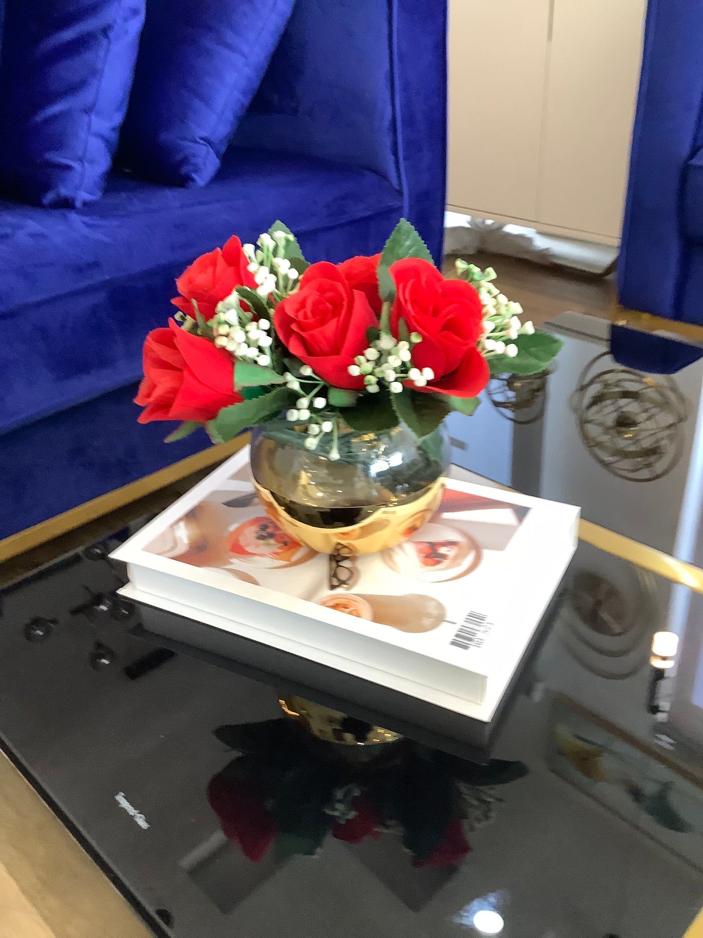 Gold vase and flower