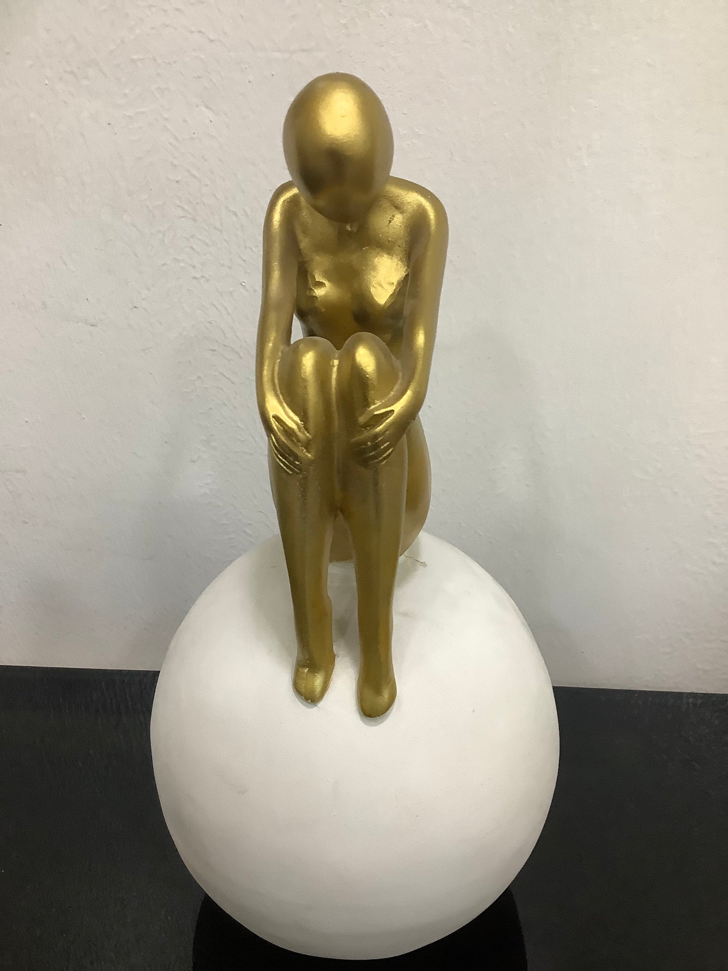 Girl on white ball decor