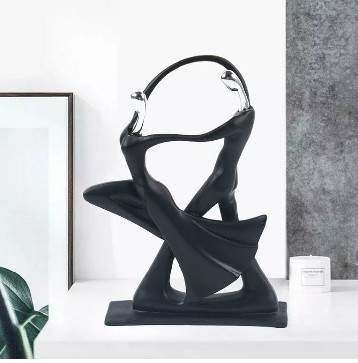 Dancing couple figurines