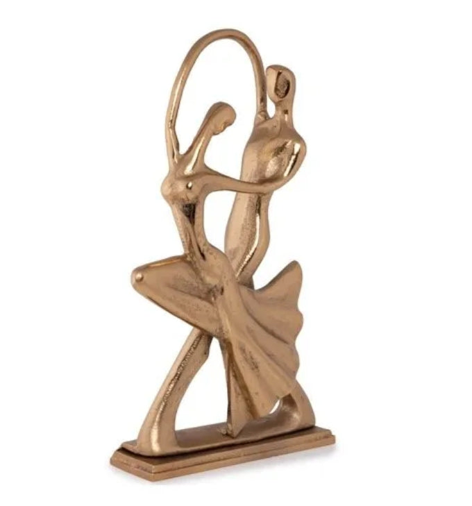 Dancing couple figurines