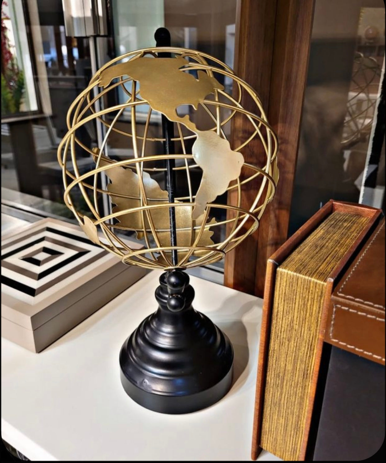 Metallic and plastic globe