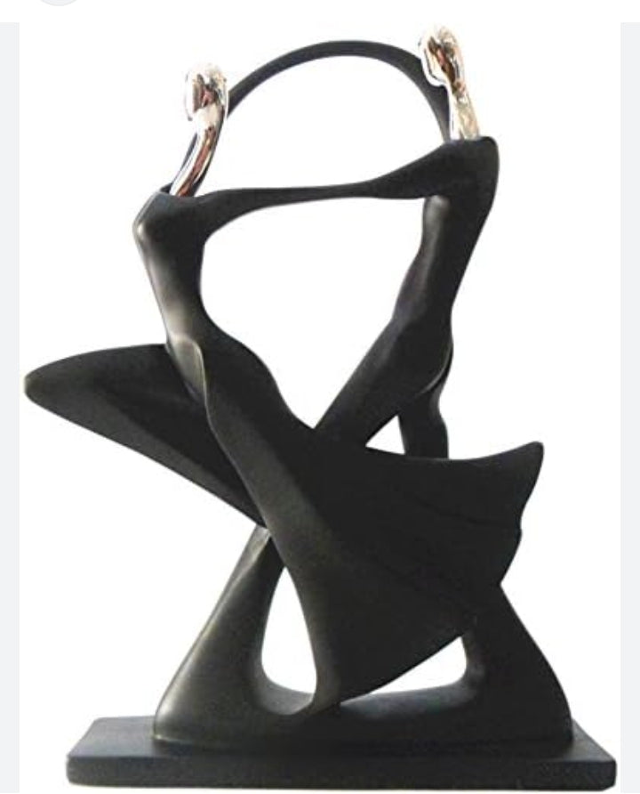 Dancing couple figurines